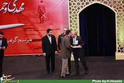شهید,شهادت,سردار,مهدی باکری,حمید باکری,بزرگداشت,یادبود,مراسم,همایش,دکتر قالیباف,سردار دهقان,سرداران شهید,برادر,تبریز,لشکر عاشورا,وزارت کشور,سالن,گزارش تصویری,عکس